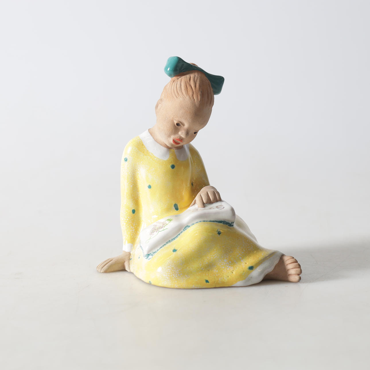 FIGURINE, partially glazed earthenware, 20th century.