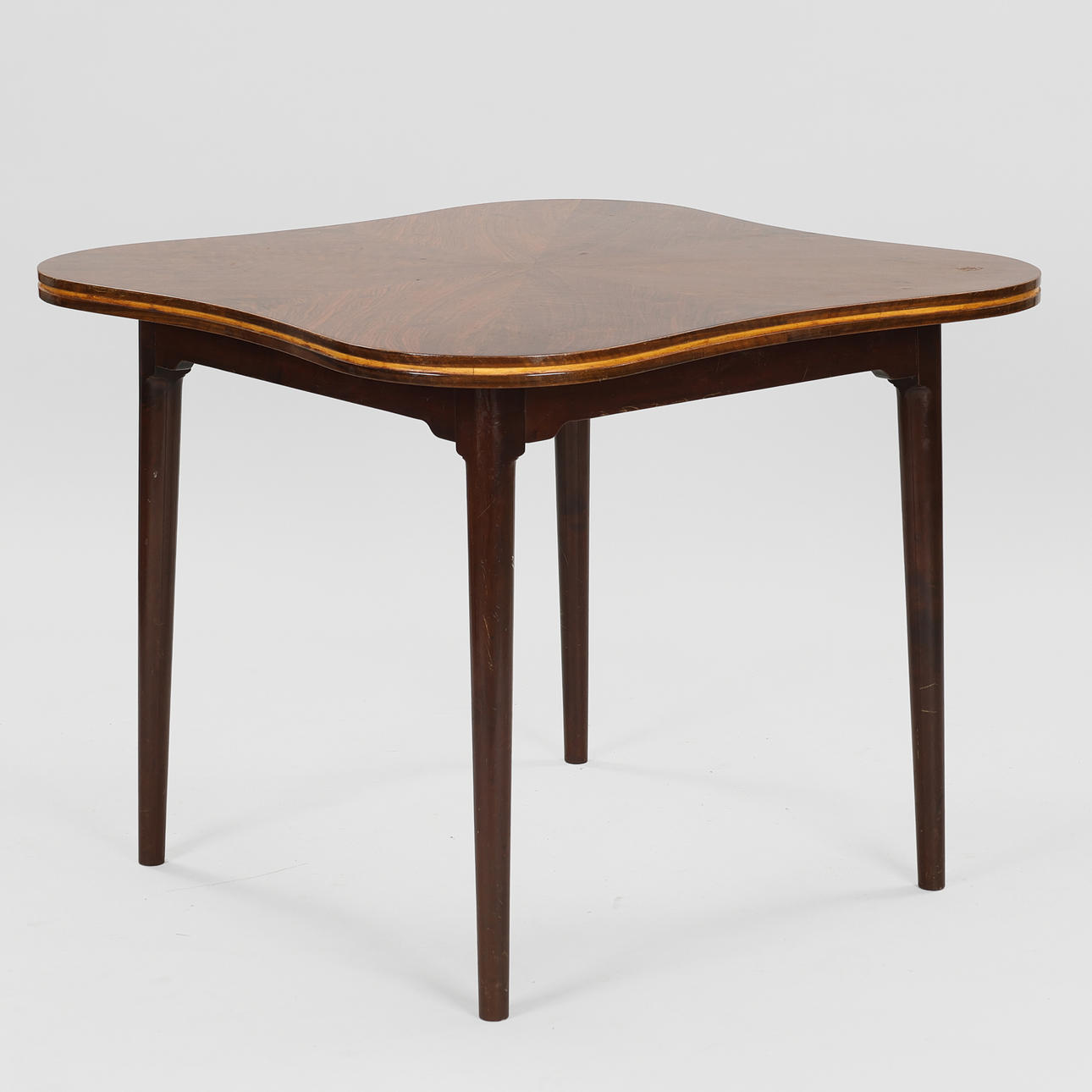 DANISH CABINETMAKER. Table with curved edge, veneered with book-matched walnut, approx. 1940s.