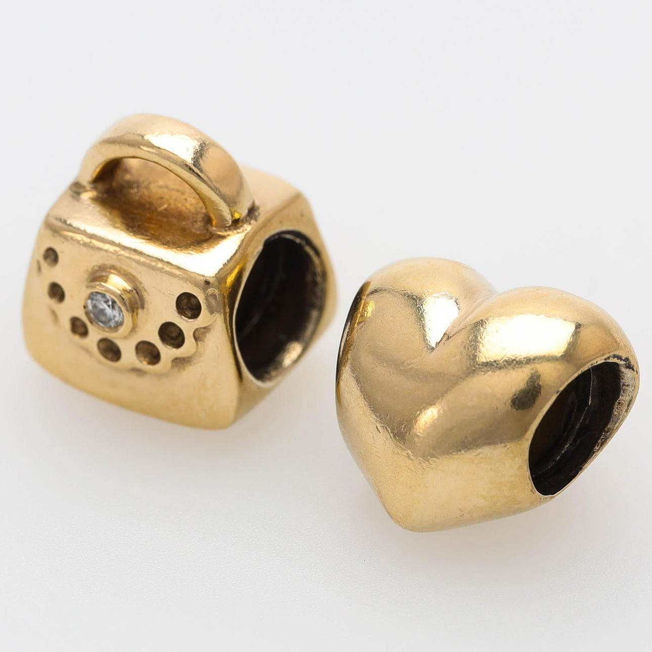 PANDORA, 2 st berlocker, 14 k guld, vikt 5,9 gram.