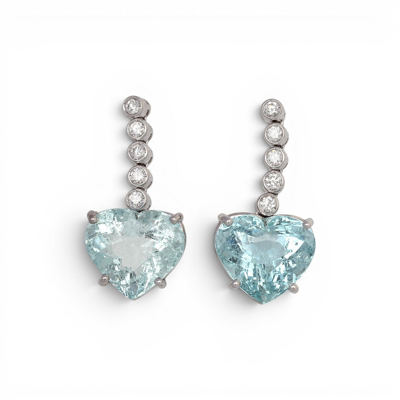 Heart-shaped aquamarines long earrings.