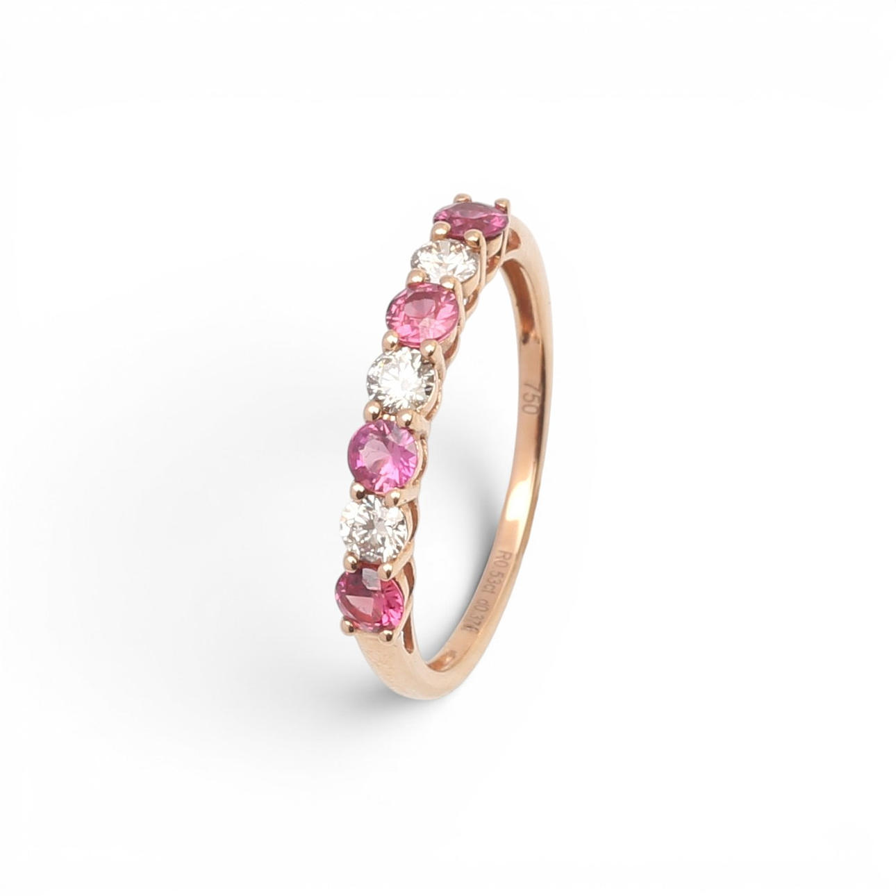 Halvalliansring med diamanter och rubiner.