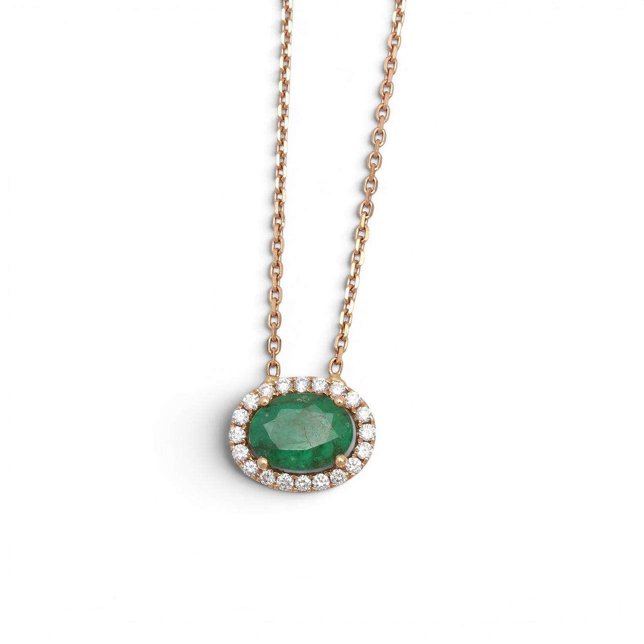 Emerald and diamonds rosette necklace.