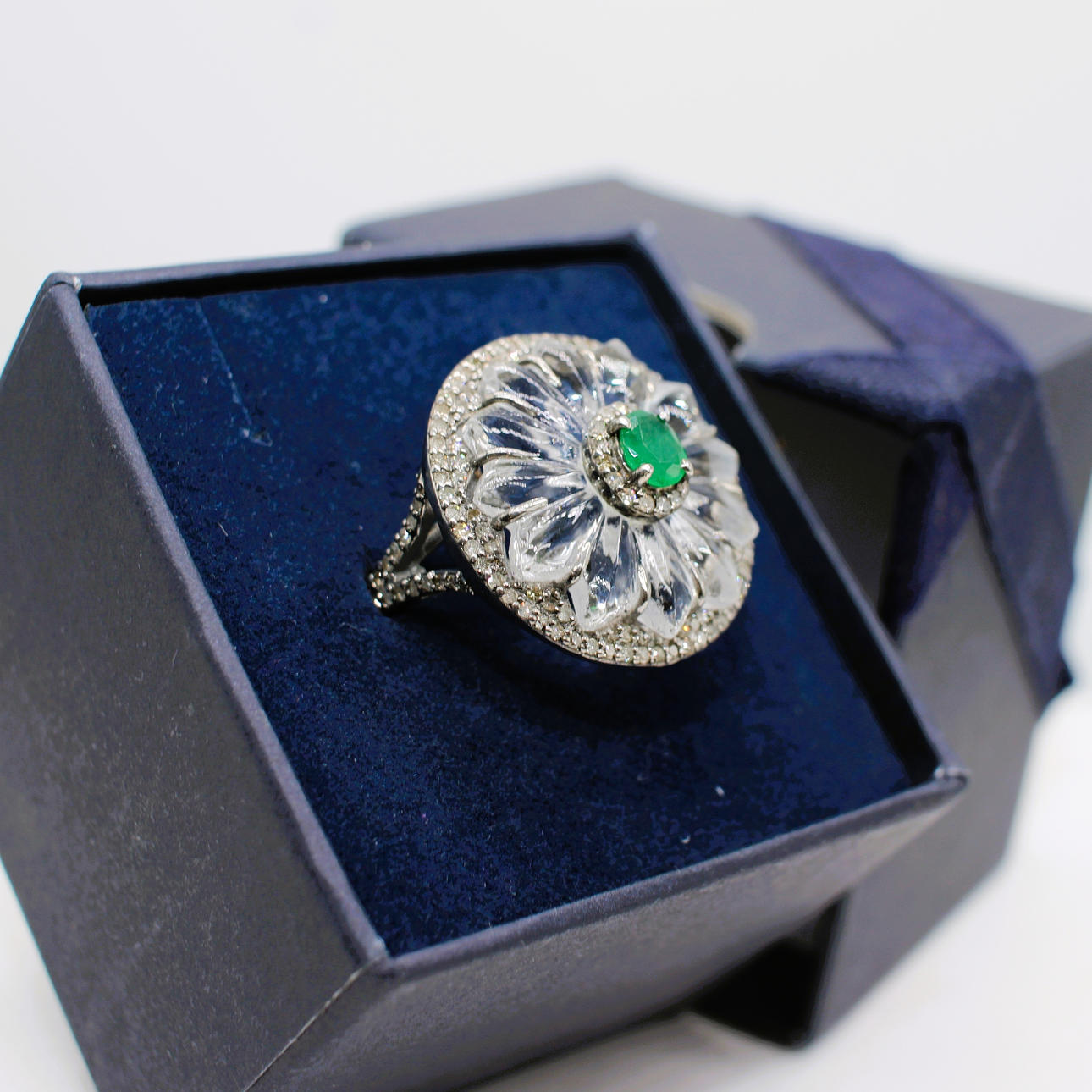 CRYSTAL, EMERALD & DIAMOND DRESS RING.