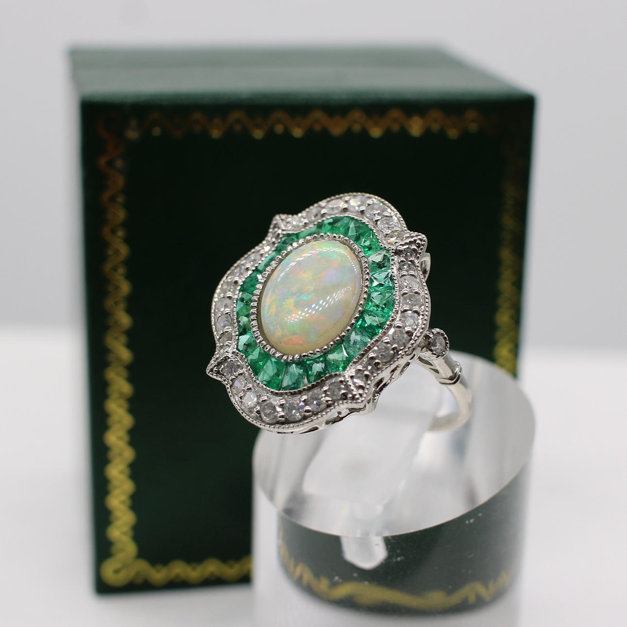 EMERALD, DIAMOND & OPAL RING.