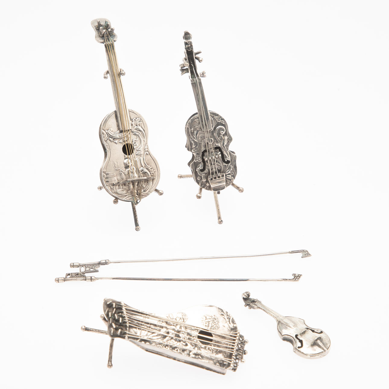 Four miniature musical instruments, silver, Netherlands and others ...