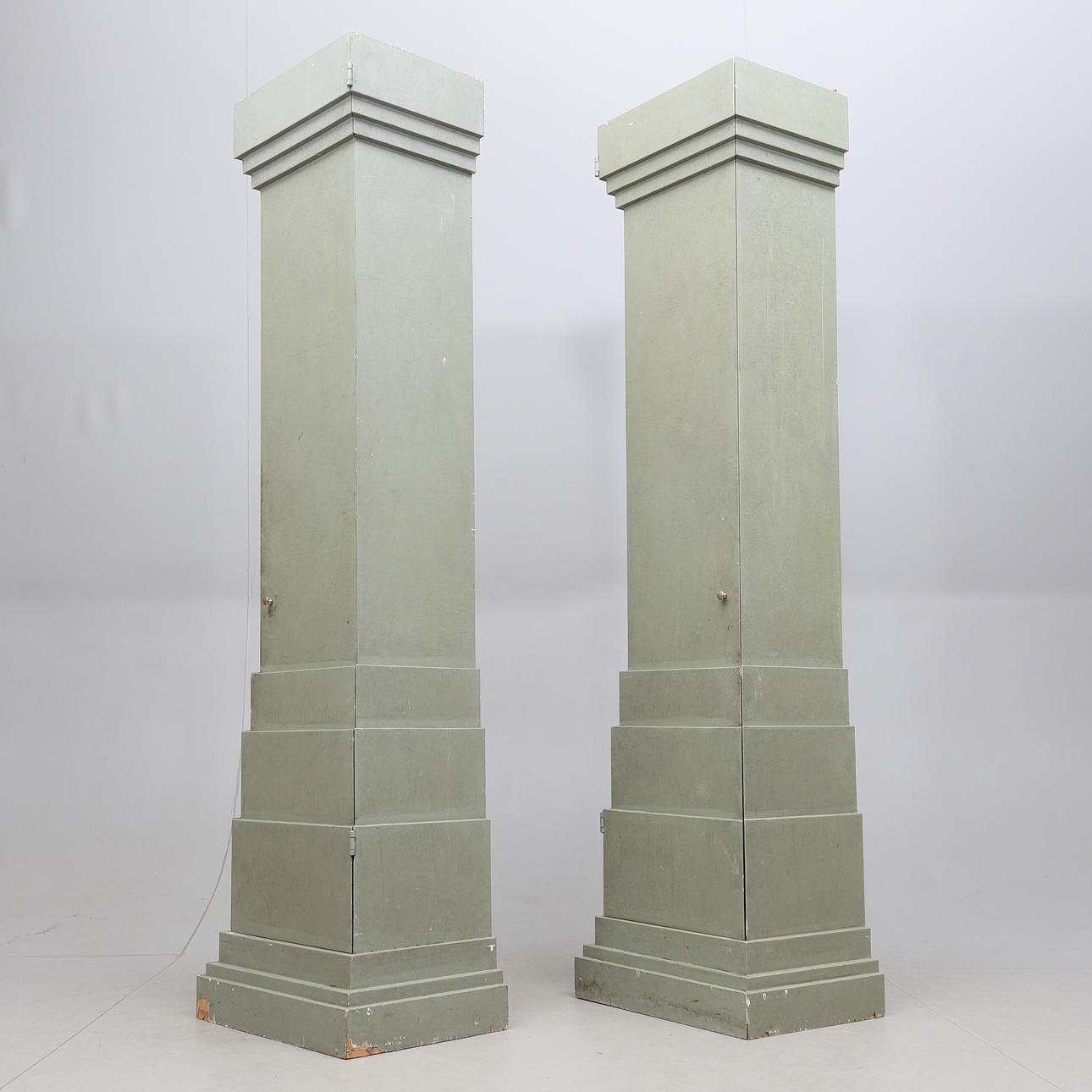 COLUMN CABINETS, a pair, 20th century.