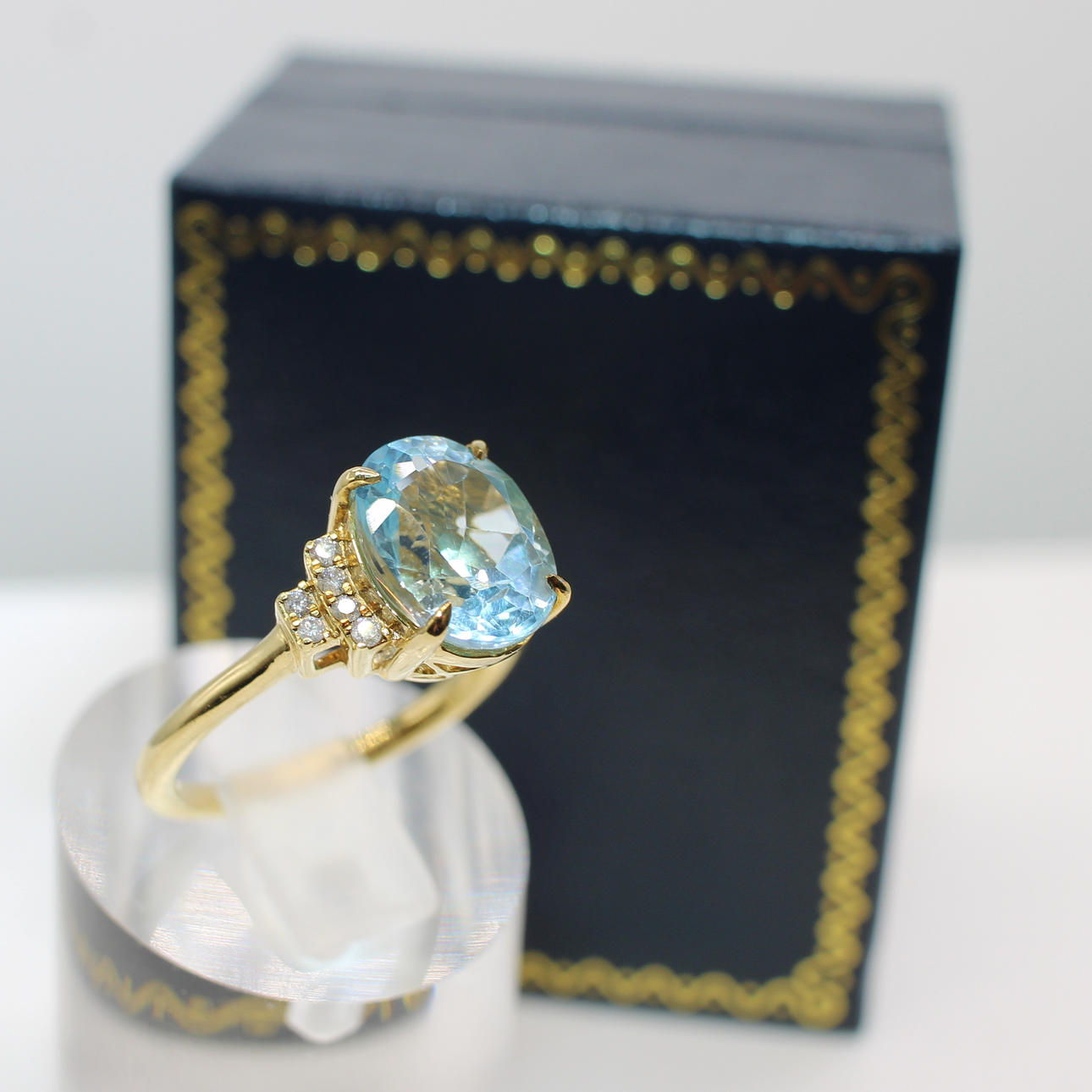 BLUE TOPAZ & DIAMOND RING.