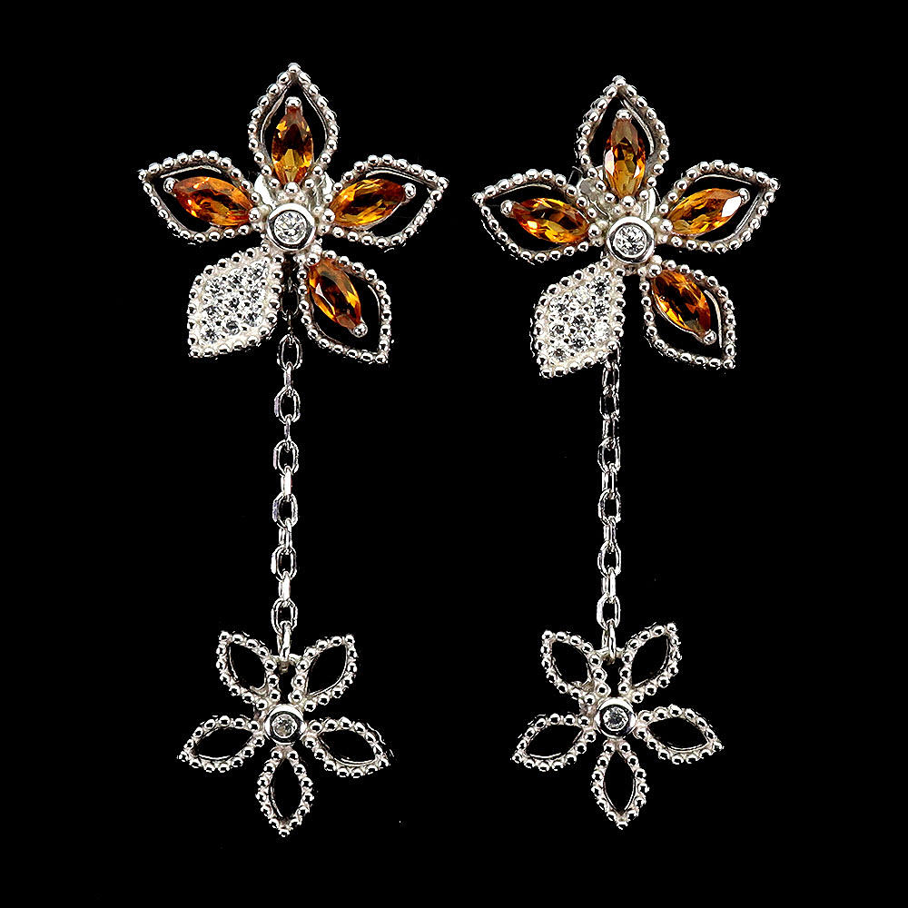 CITRINE FLOWER SHAPED EARRINGS.