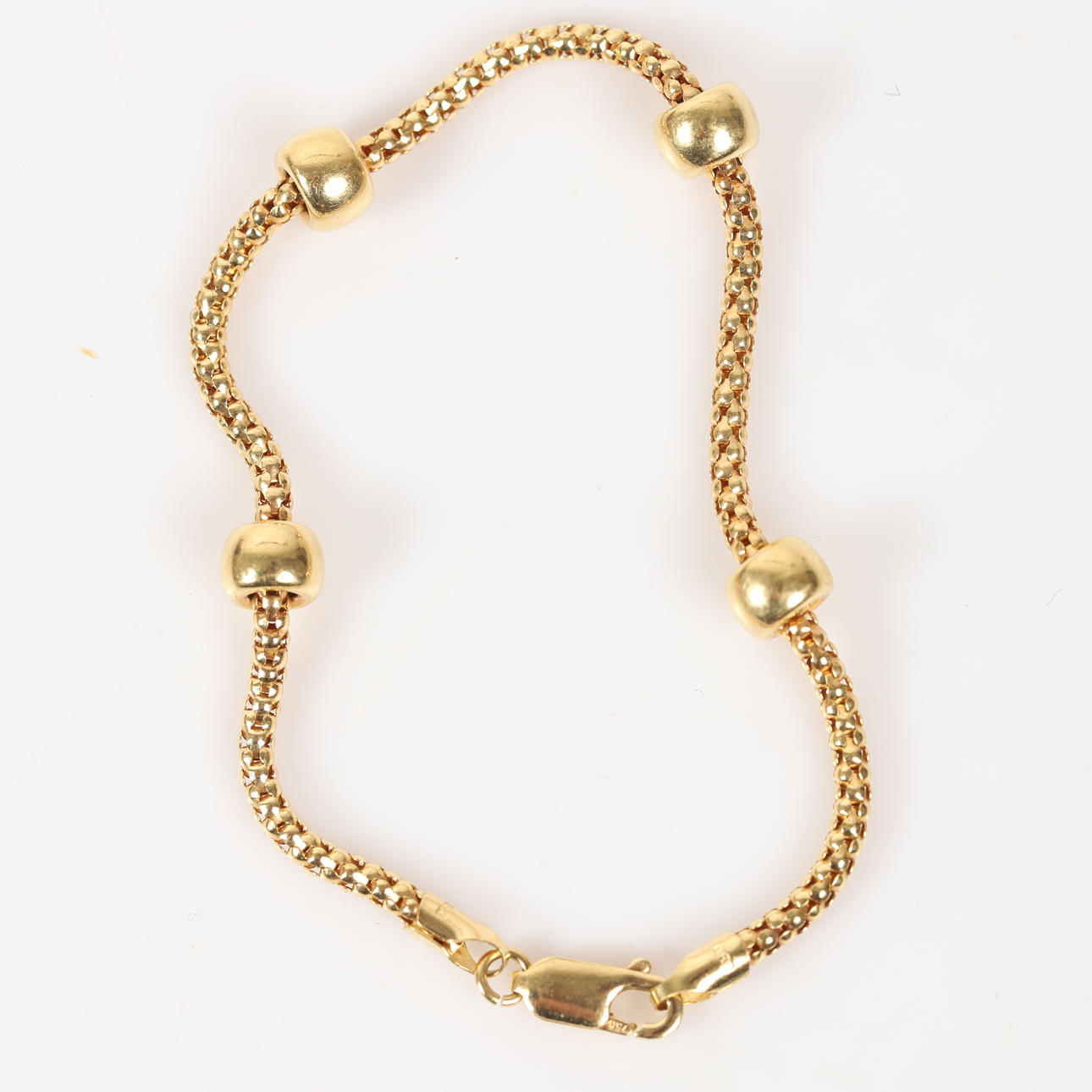 ARMBAND, 18 K guld.