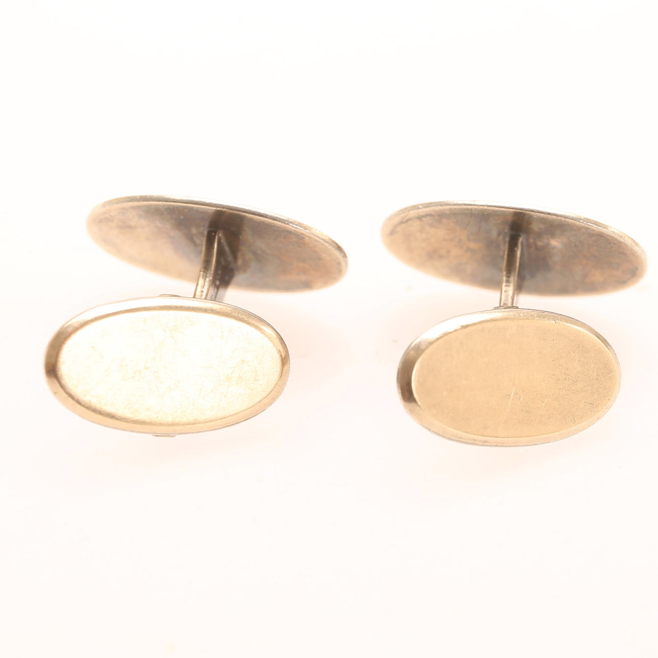 MANSCHETTKNAPPAR, ett par, silver/guld.