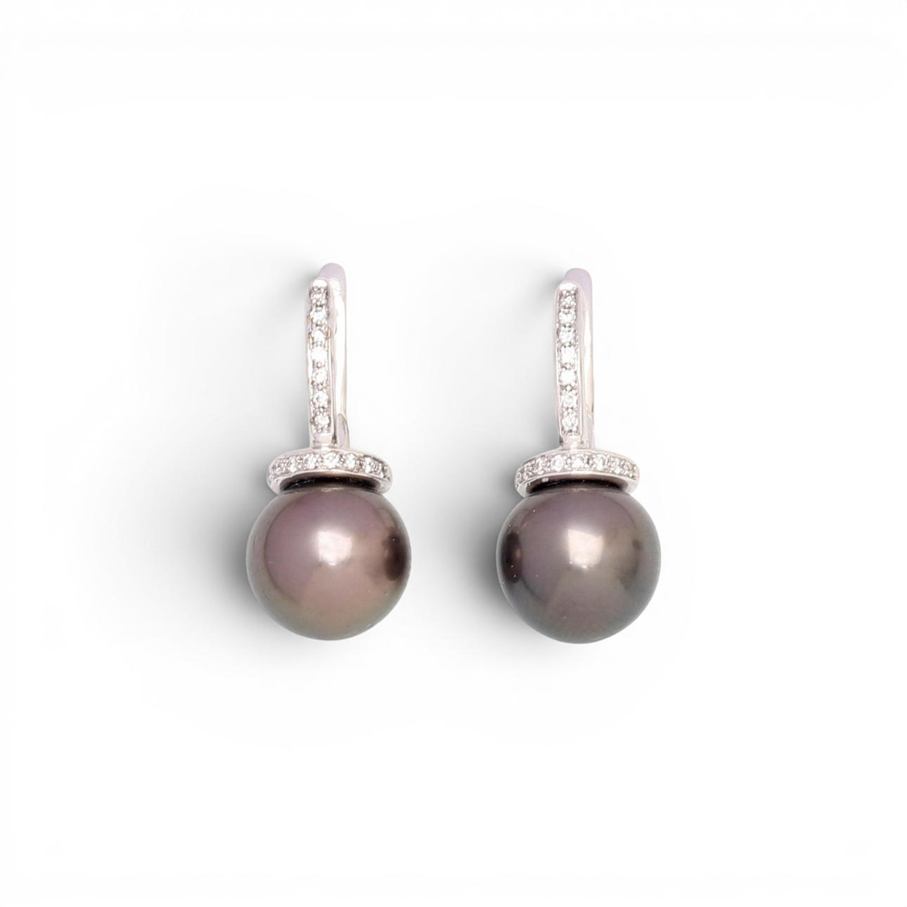 Brown pearls and diamonds earrings.