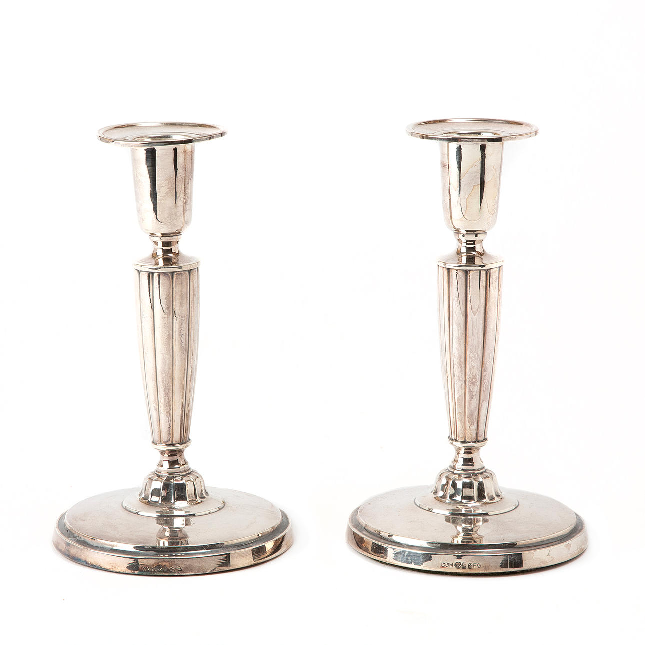 LJUSSTAKAR, ett par, silver, 1956.