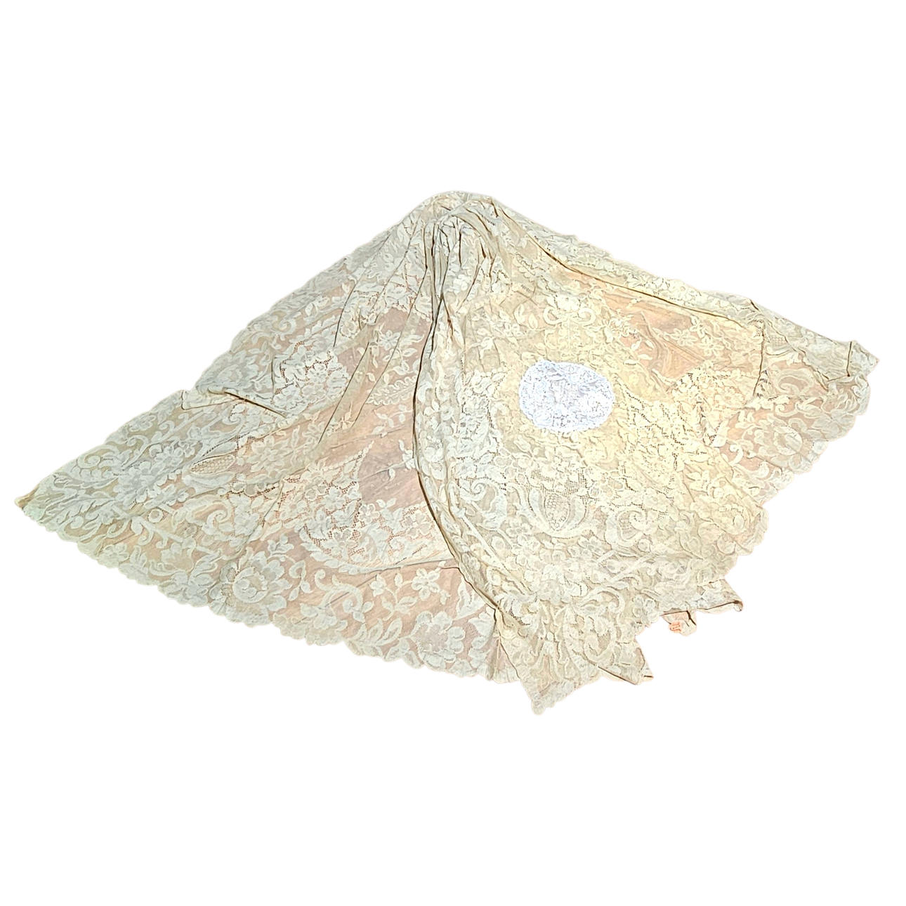 Beige lace tablecloth.