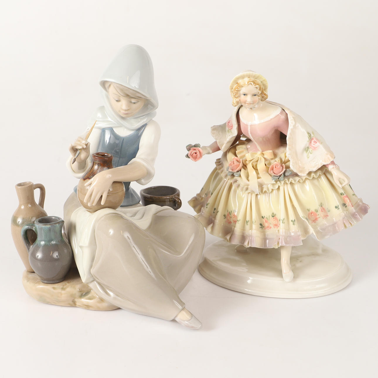 FIGURINER, 2 stycken, porslin, bl. a. Lladro, Spanien.
