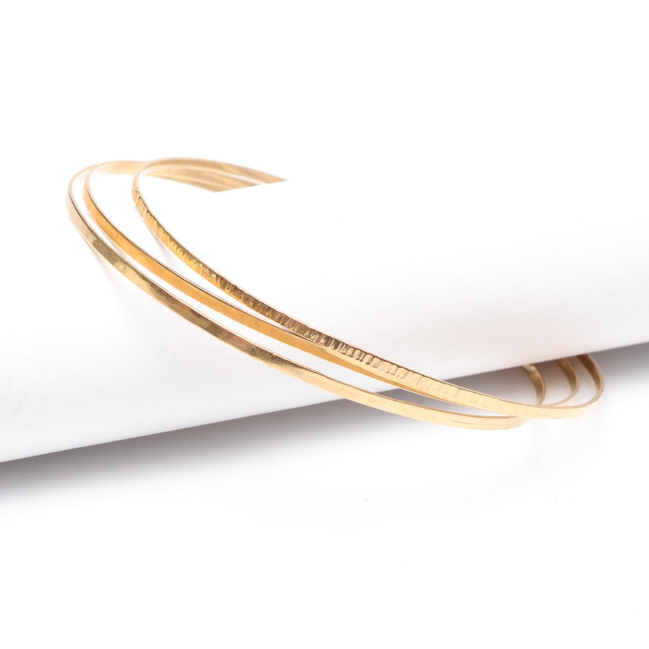 8. STEL ARMRING. 18k guld, vikt ca 8gram.