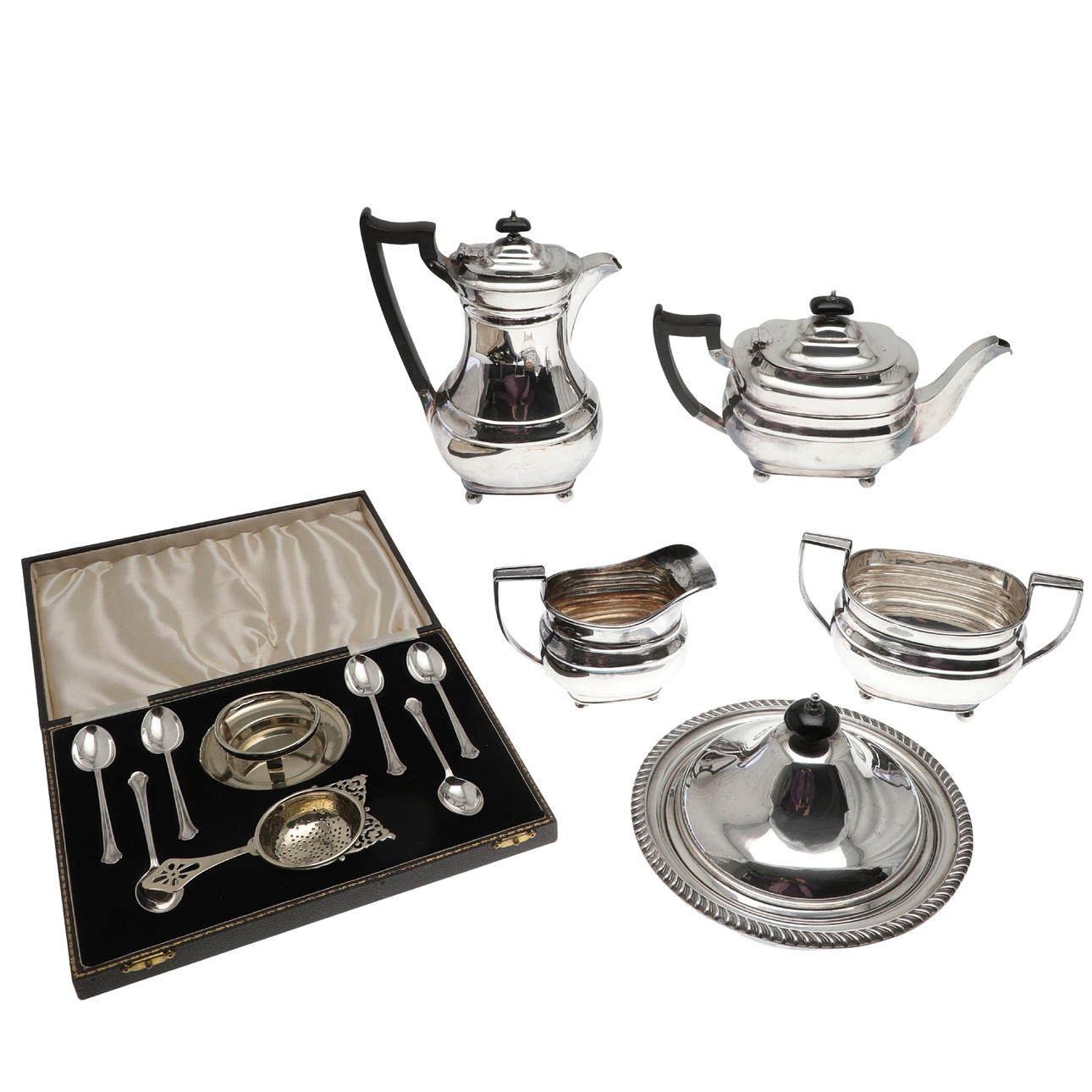 A FOUR PIECE SILVER PLATED TEA SET. Silver & Metals - Silver - Auctionet