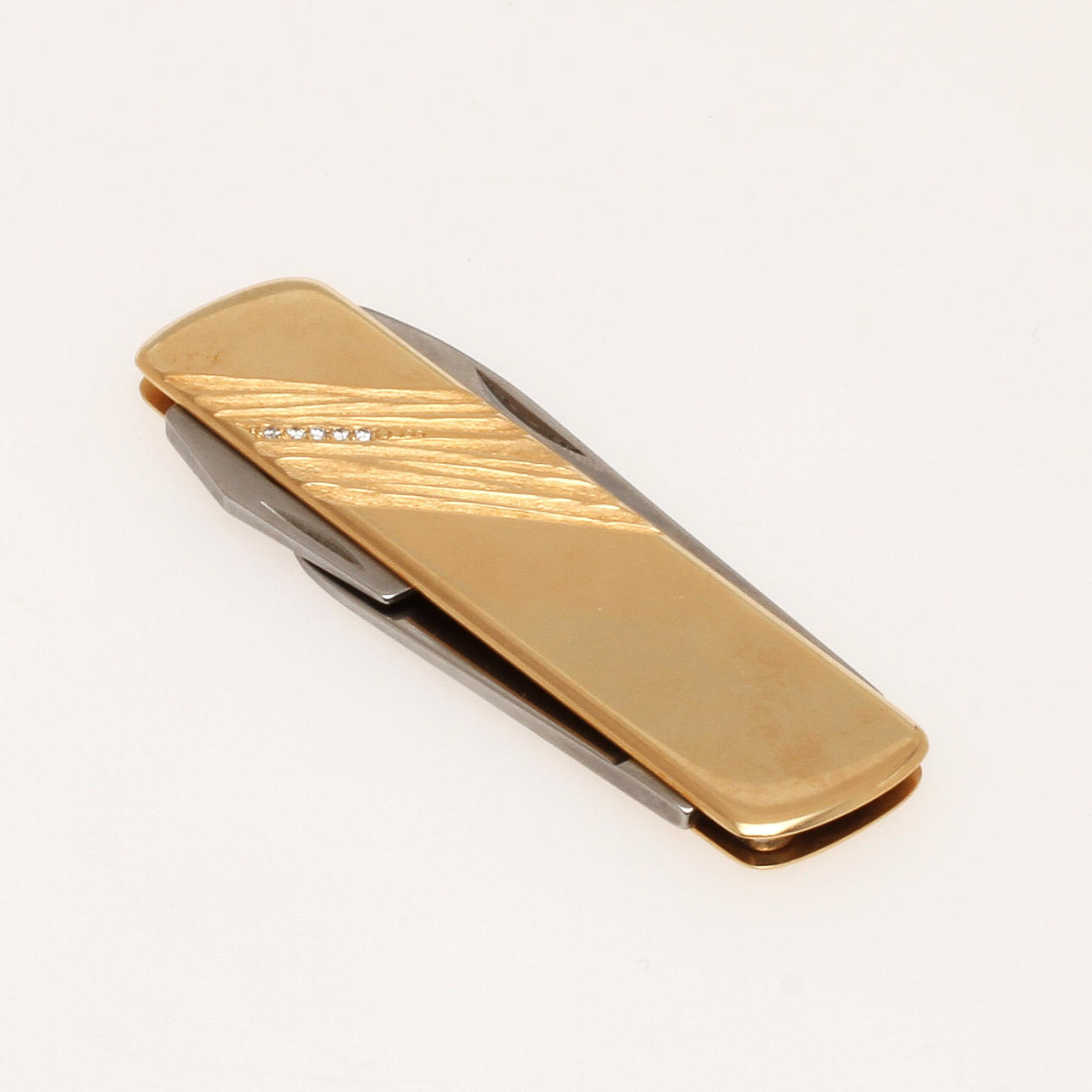 FICKKNIV, 18K rödguld samt stål med diamanter, totalt ca 0,05 ct, Ekström Sweden Ab, 1987. Vikt 47,93 g.