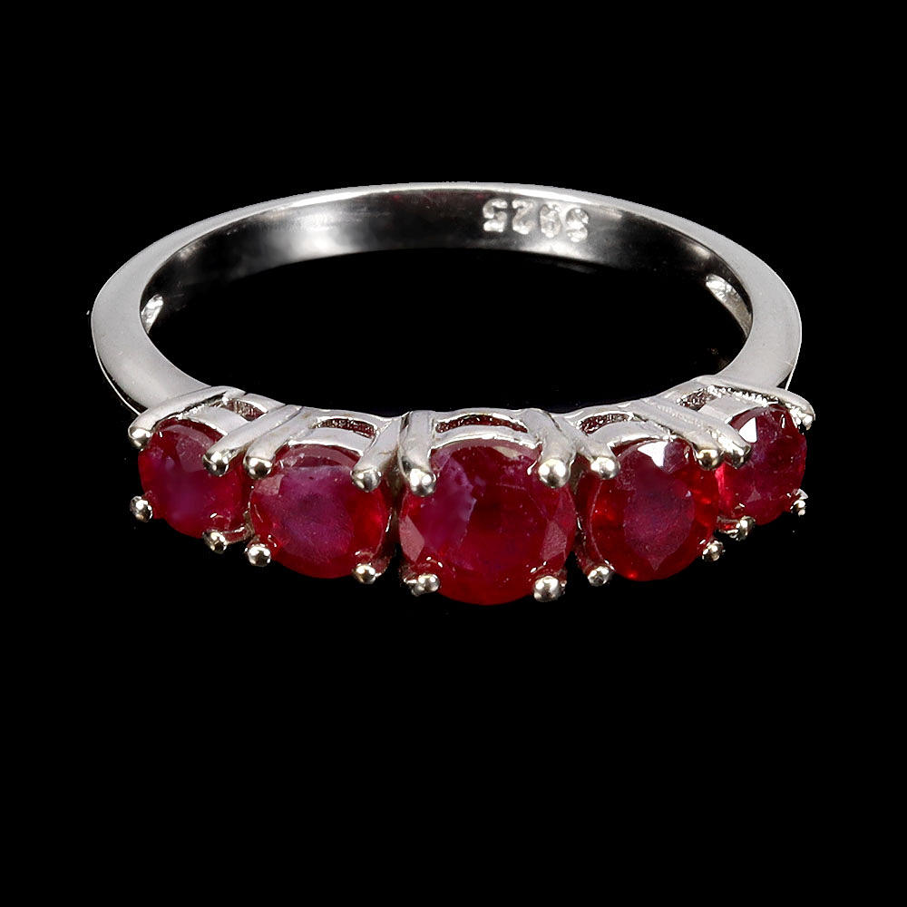 RUBY HALF ETERNITY RING.