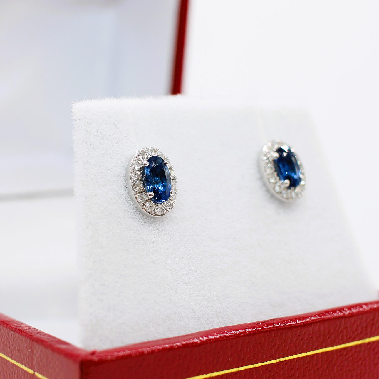 SAPPHIRE & DIAMOND CLUSTER EAR STUDS.