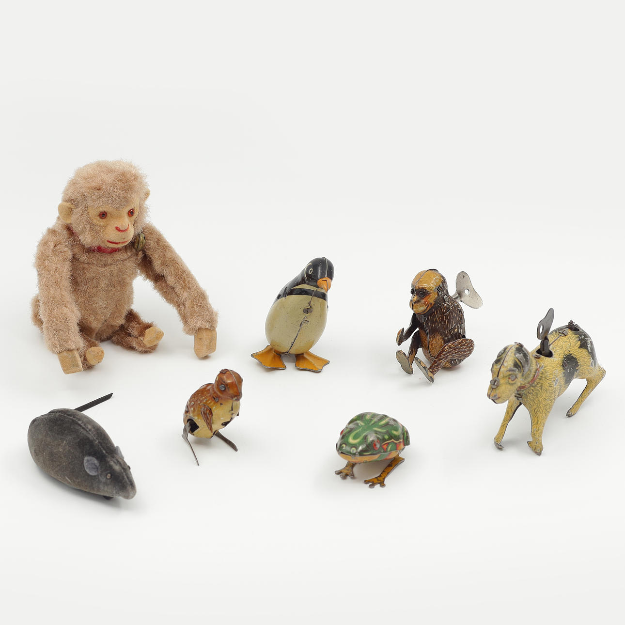 7 VINTAGE MECHANICAL TOYS.