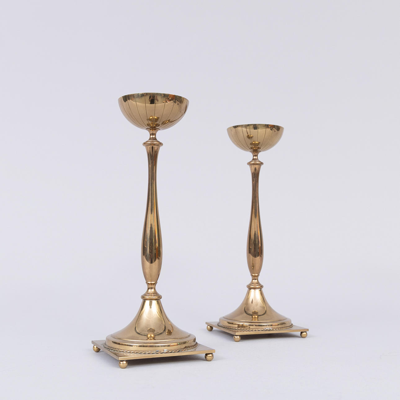 GUNNAR ANDER. Candlesticks, a pair, brass, Ystad-Metall, signed.