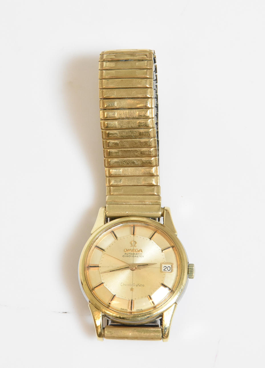 HERRARMBANDSUR, Omega Constellation, guld på stål, automatic.