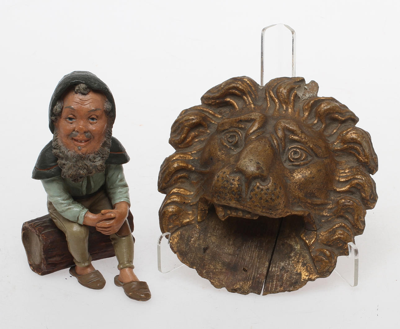 FIGURIN, i form av tomte och LEJONMASKARON.