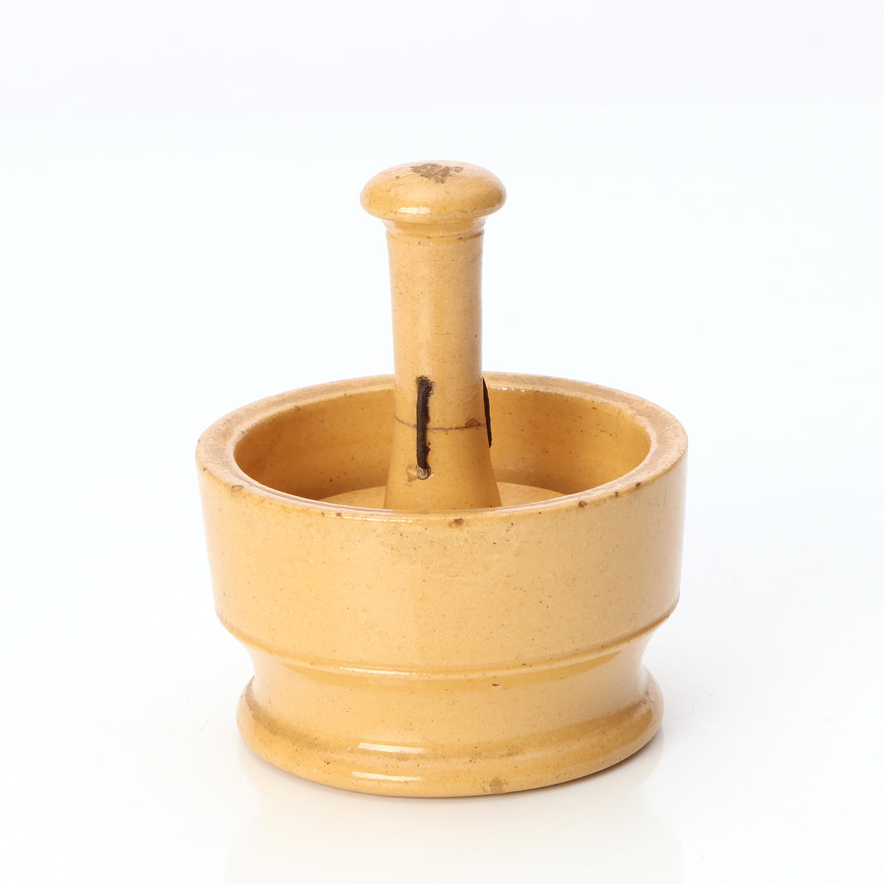 BUTTER PRESS, HÖGANÄS. Glazed ceramic. 19th century.