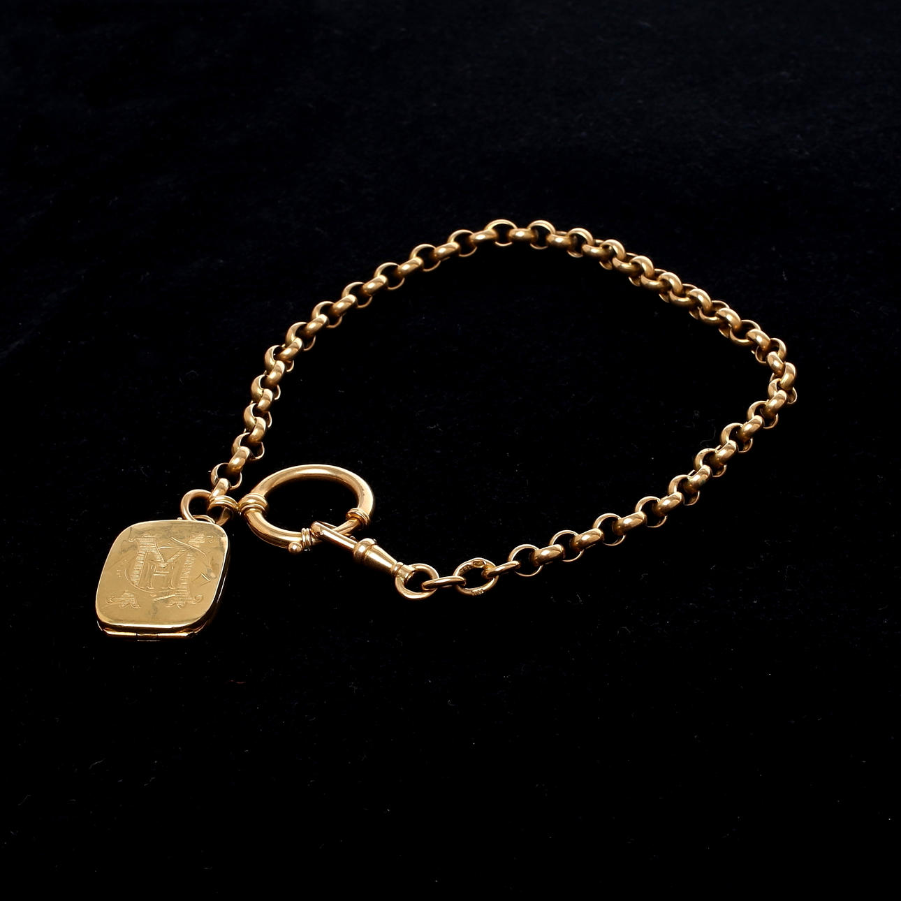 KLOCKKEDJA med hänge, 18k guld, 1900-talets första hälft.