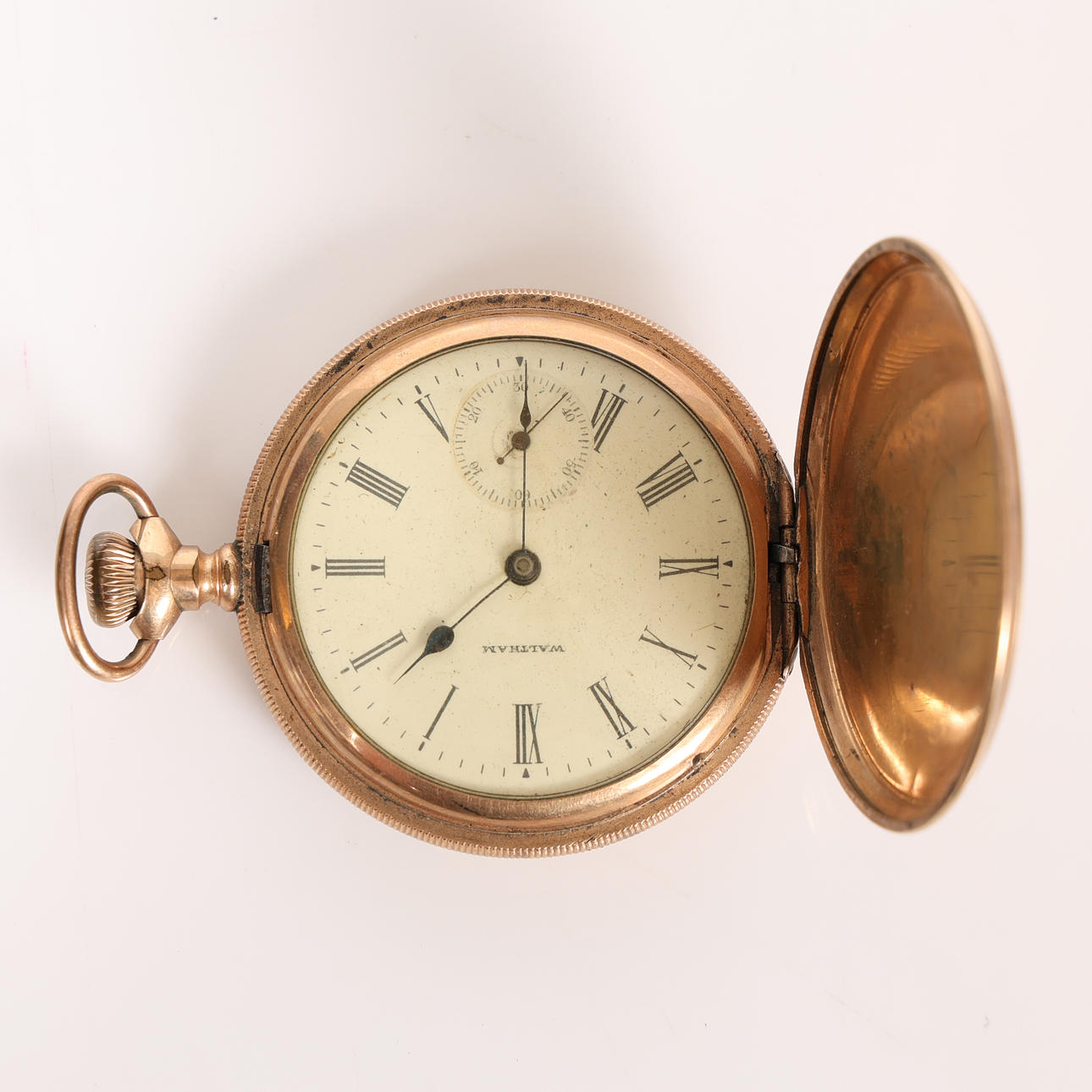 A GOLD-PLATED WALTHAM POCKET WATCH.