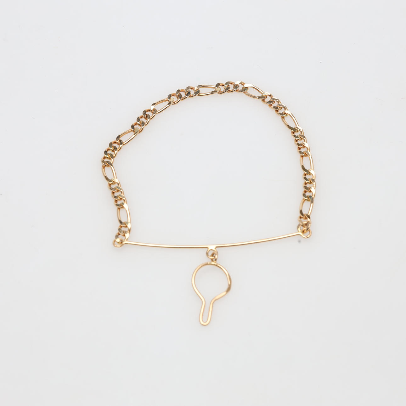 SLIPSSMYCKE 18K, guld, vikt ca 3,7 gram.