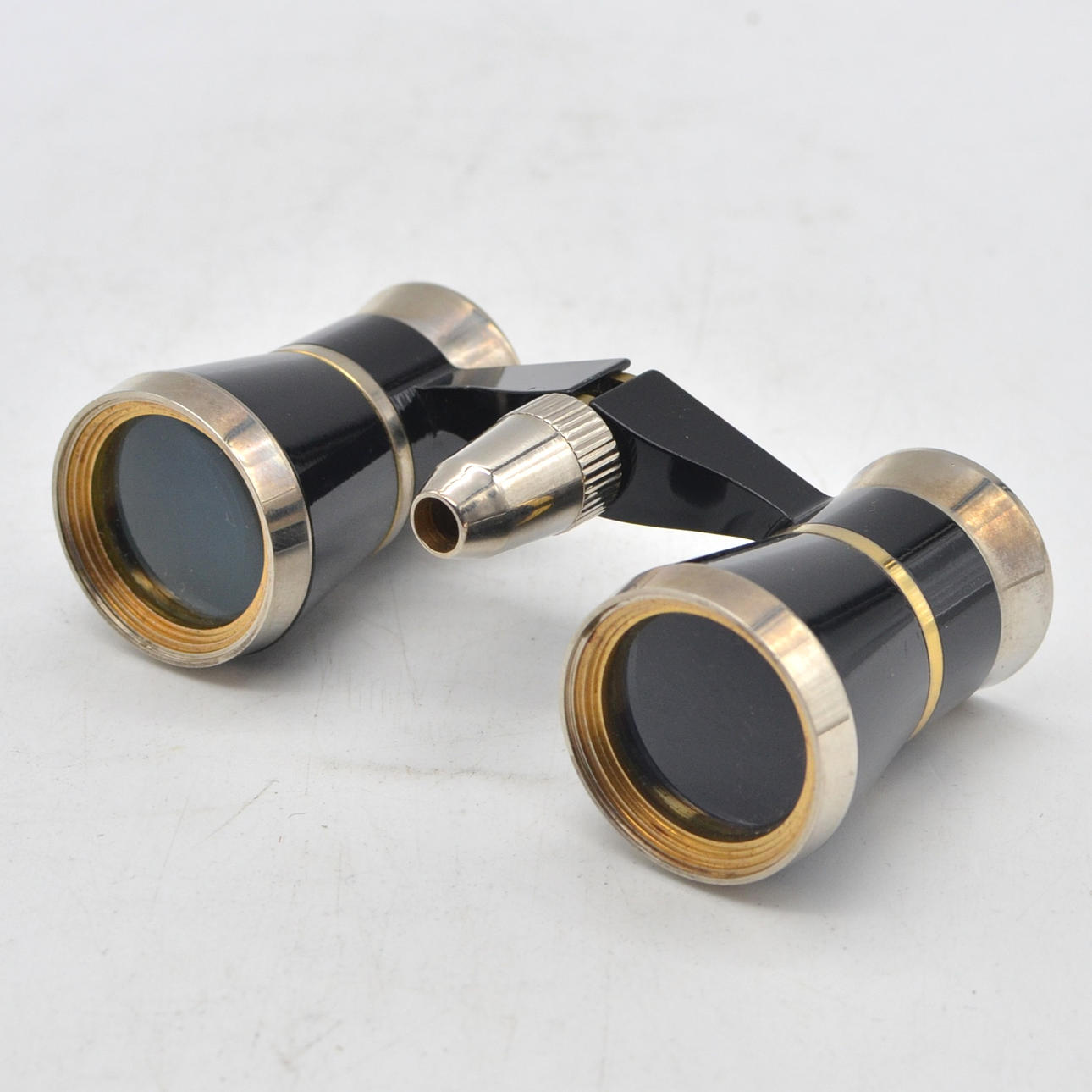 OPERA GLASSES WITH LIGHT, BLACK-GOLD, CIRCA 1980S.