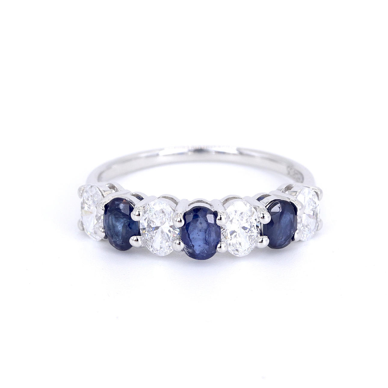 9CT SAPPHIRE AND DIAMOND HALF ETERNITY RING.