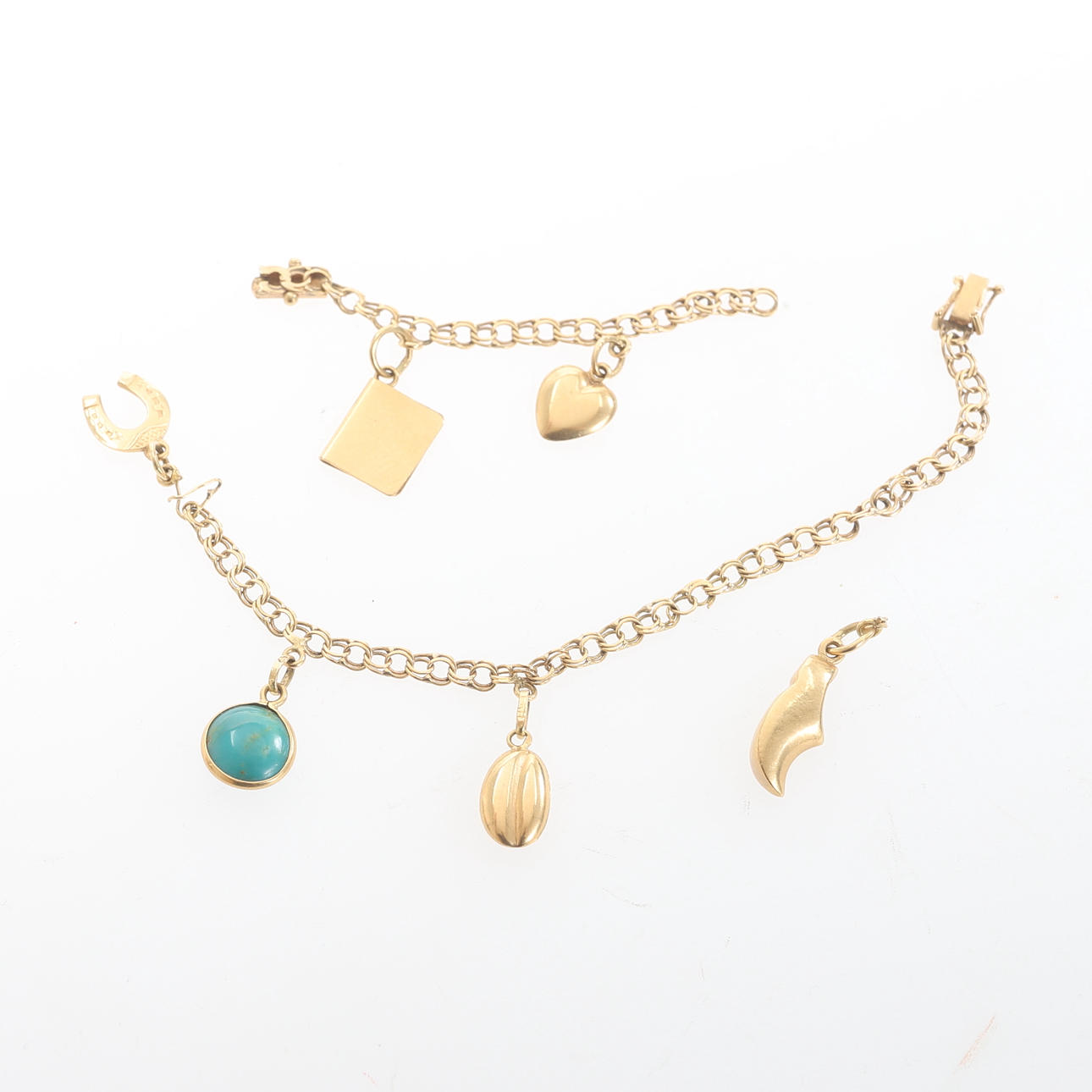 ARMBAND, med berlocker, 18 k guld.