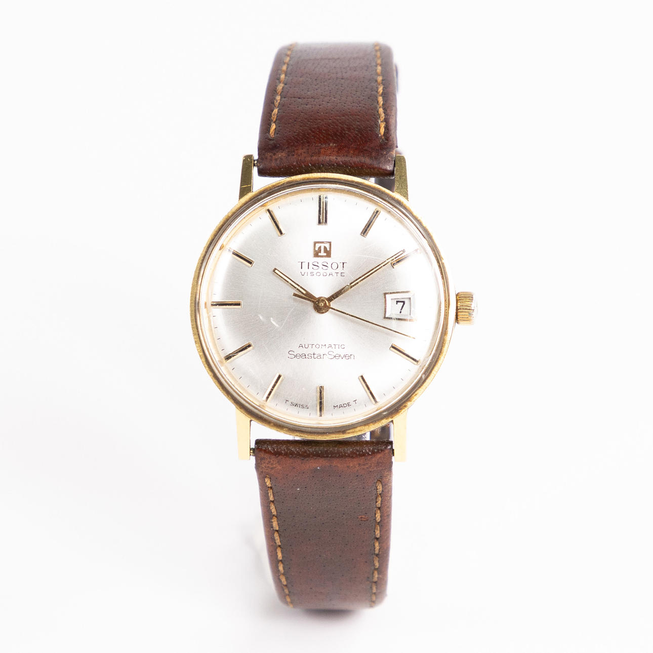 TISSOT. Seastar Seven Automatic, 34 mm, 18k guld.