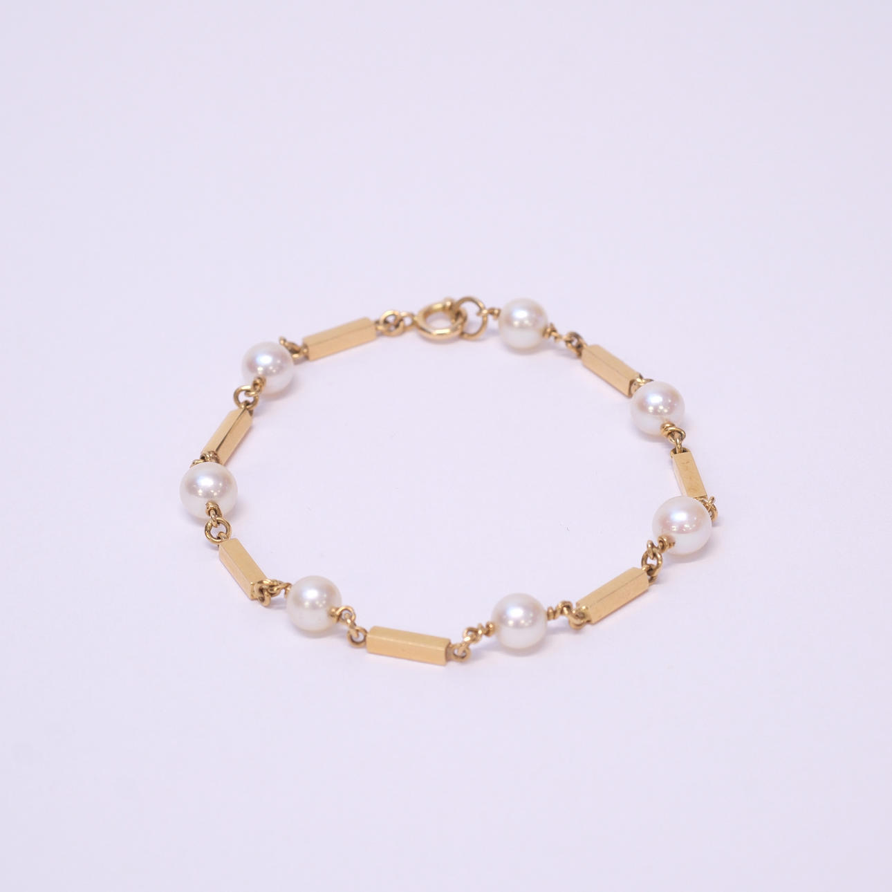ARMBAND MED PÄRLOR, 18K GULD.