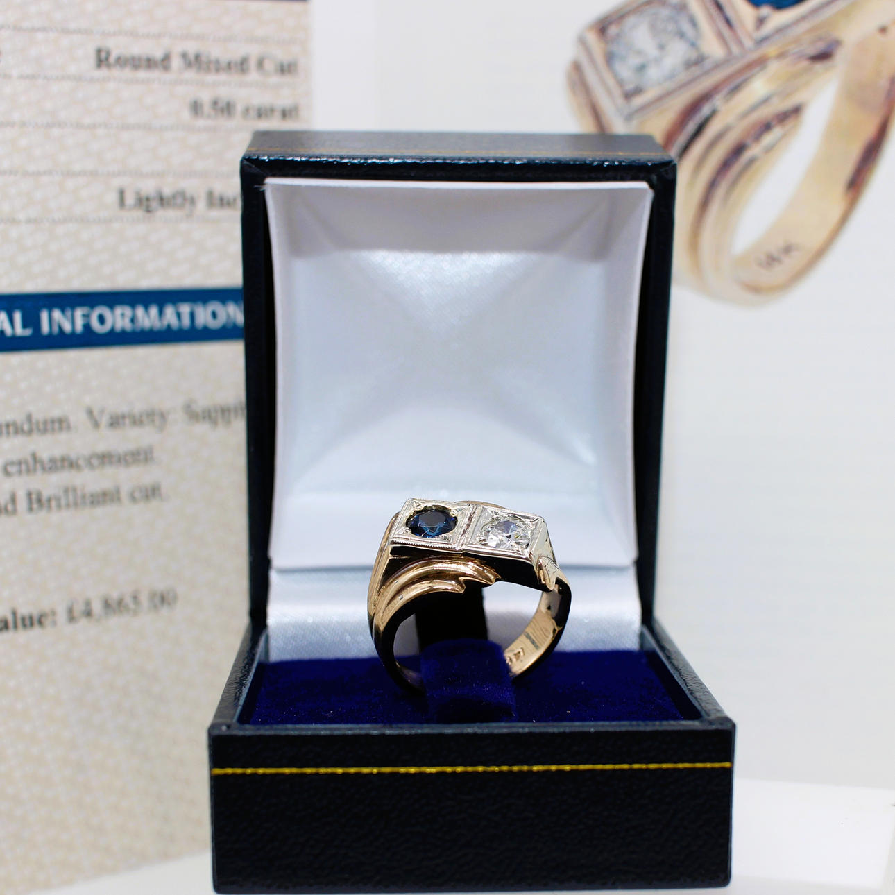 UNUSUAL CERTIFIED SAPPHIRE & DIAMOND RING.