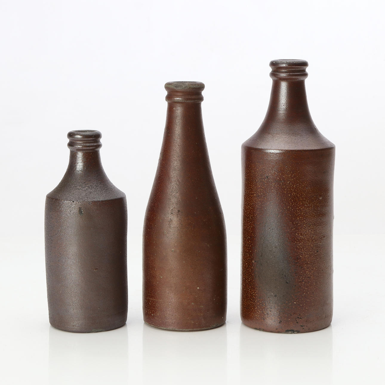 HÖGANÄS, BOTTLES, THREE PCS. Salt-glazed stoneware.