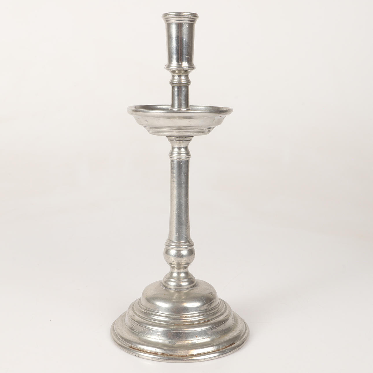 LJUSSTAKE, tenn, 1900-tal.