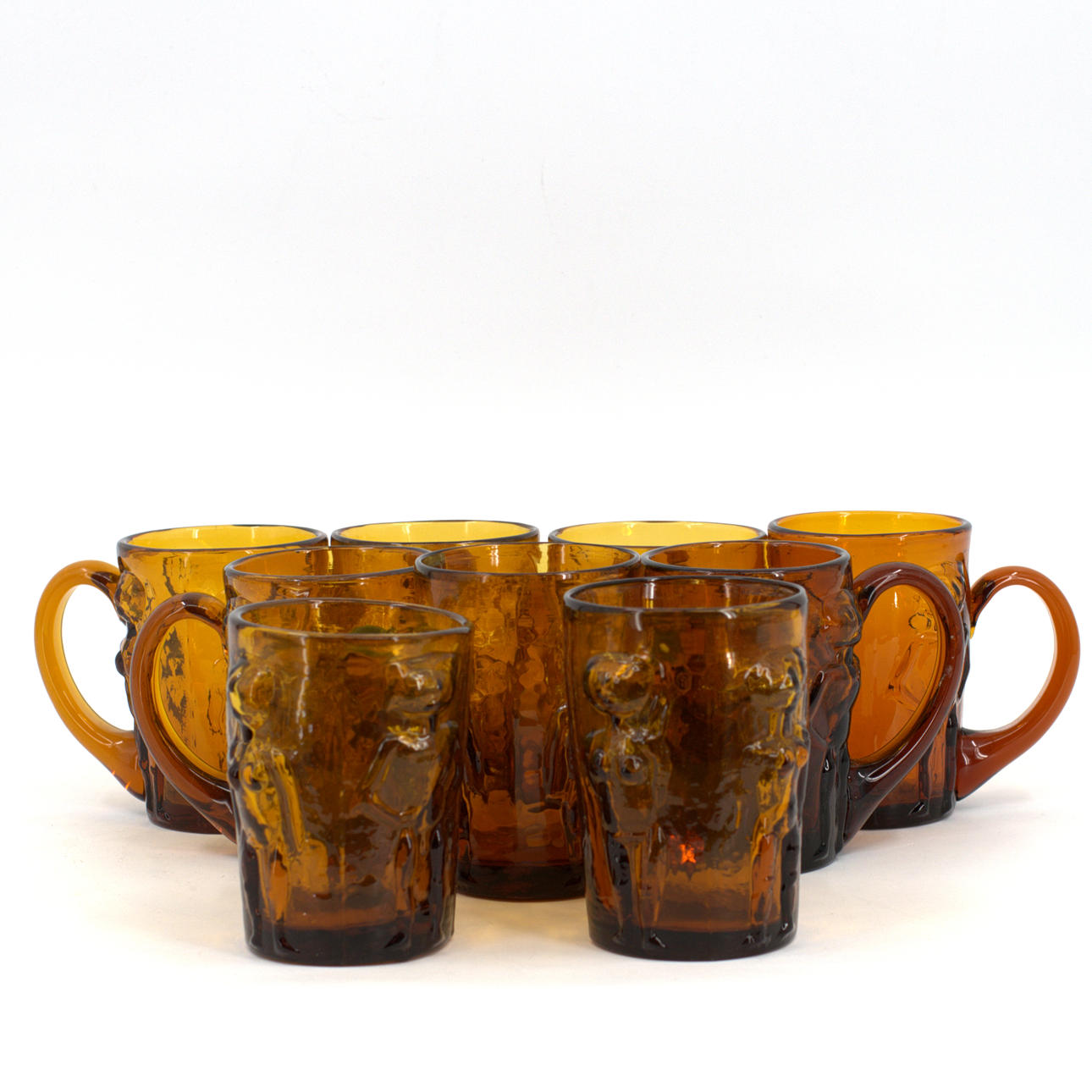 ERIK HÖGLUND. Beer steins, 9 pcs, brown-tinted glass, figures in