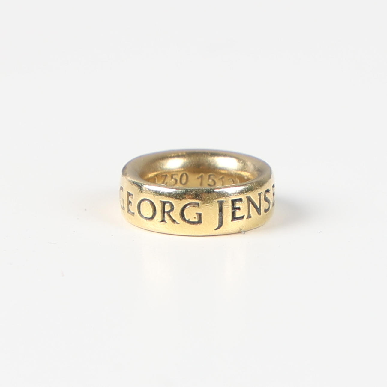 GEORG JENSEN, liten berlock 'Magic' i 18K guld.