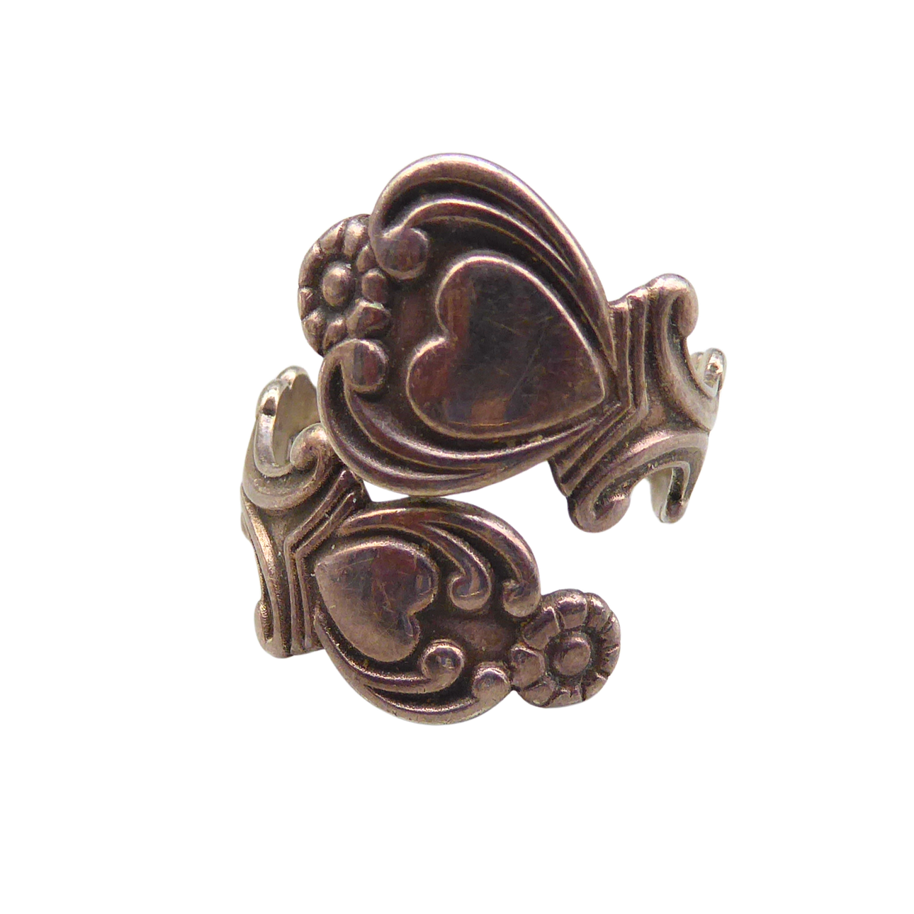 AVON WRAP RING IN 925 STERLING SILVER WITH HEART AND FLOWER PATTERN, ADJUSTABLE.