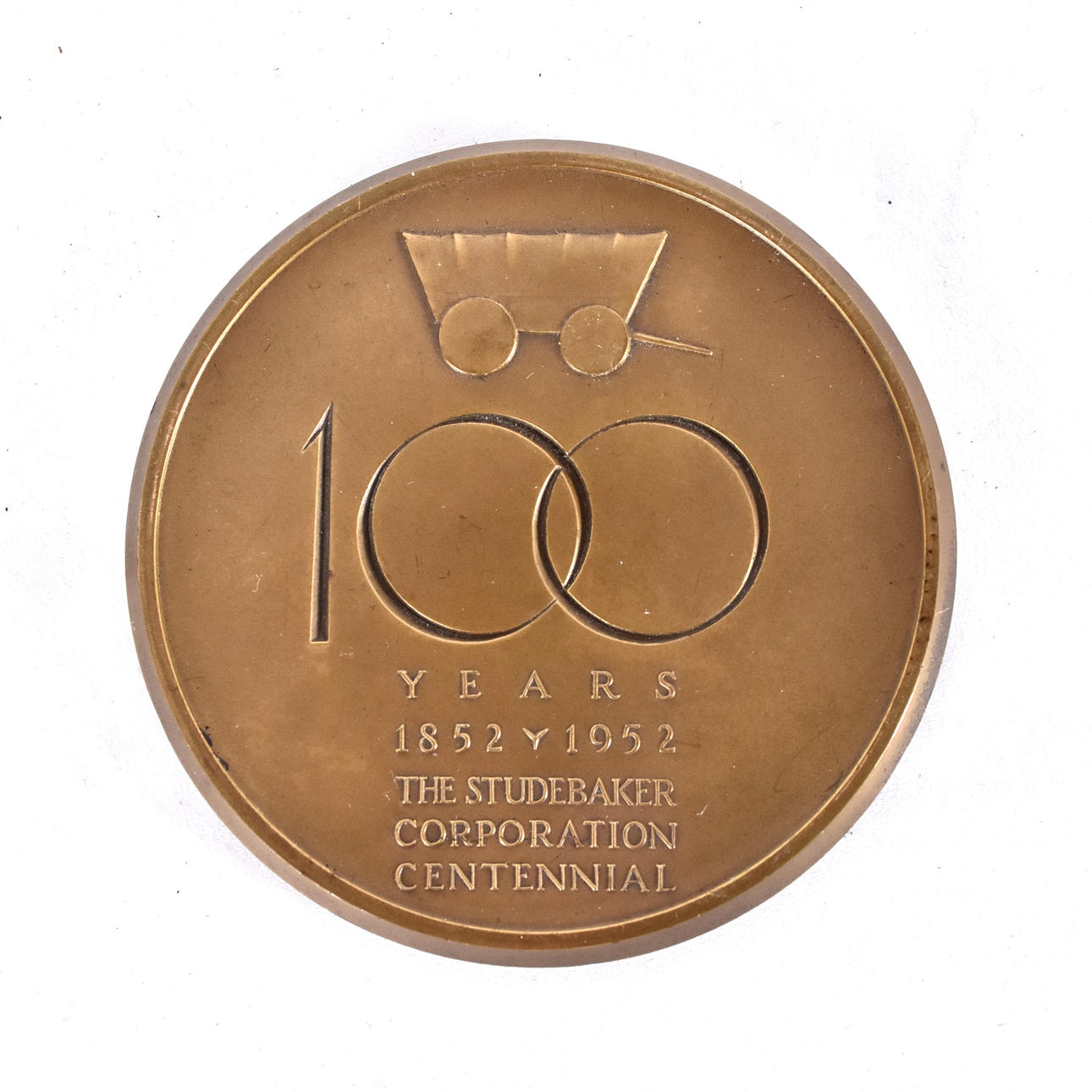 MEDALJ, brons, Studebaker 100 år.