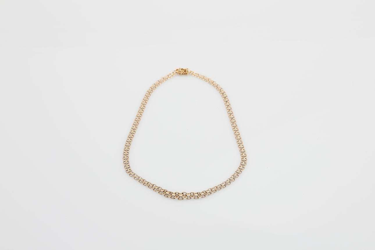 NECKLACE, graduated X-link, 18K gold.