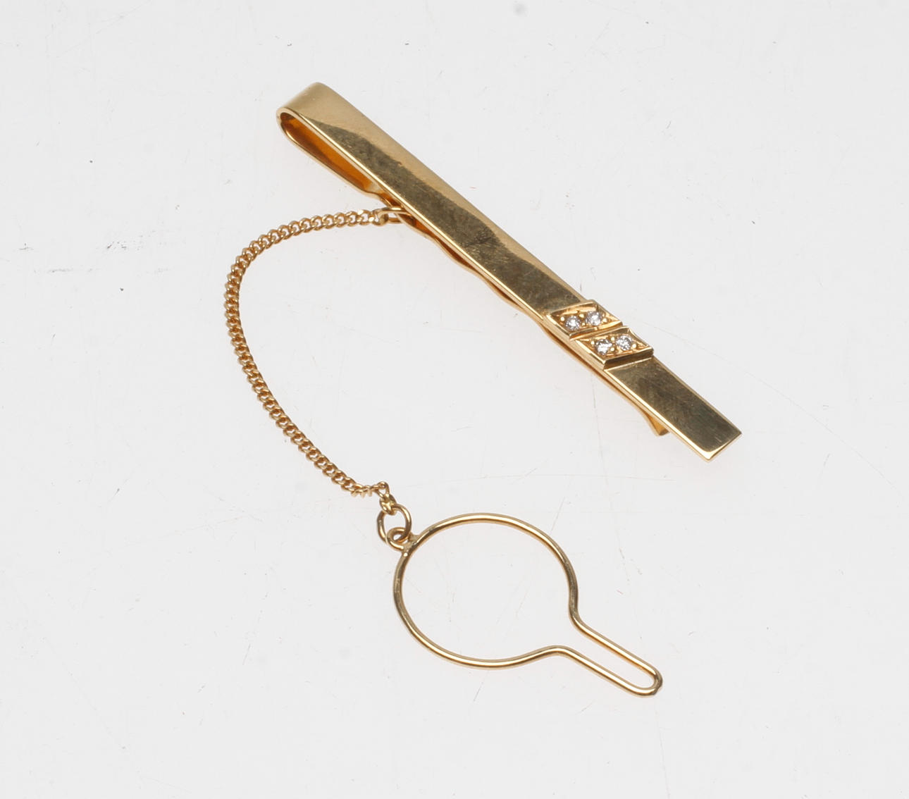 SLIPSNÅL, 18k guld med diamanter, vikt ca 4,7 gram.