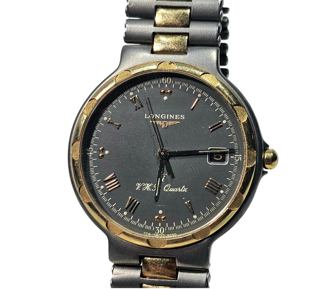 Longines Conquest Titanium V.H.P. Quartz. Wristwatch. Clocks