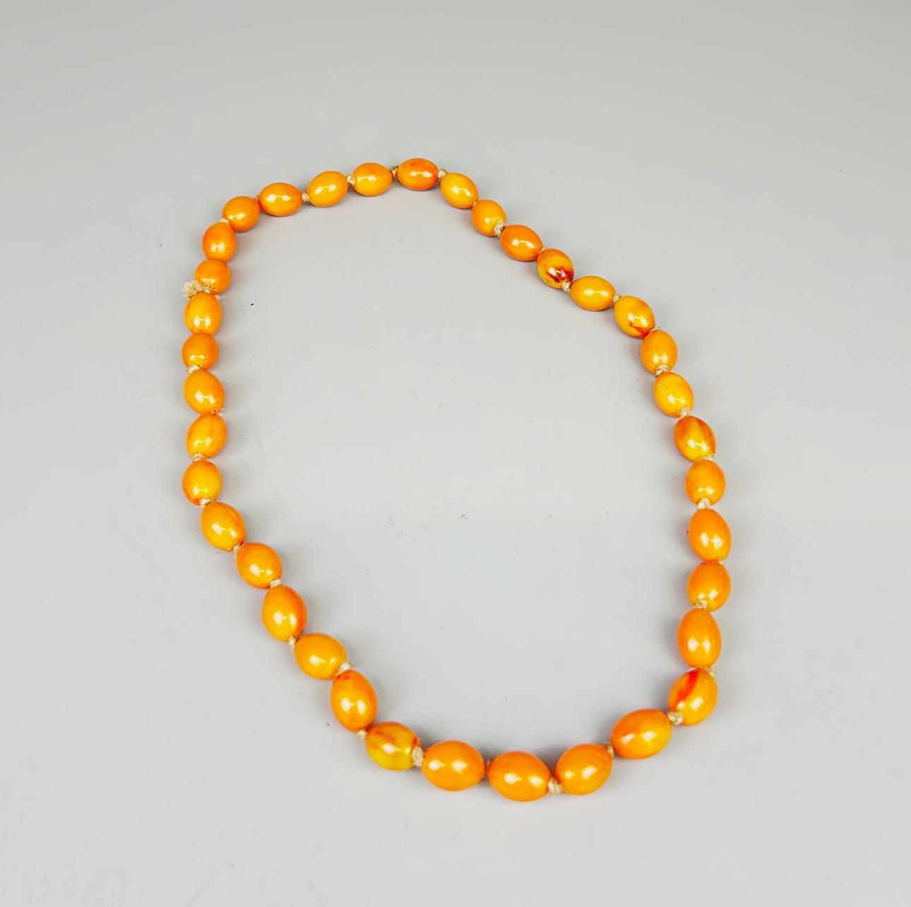 FAUX AMBER NECKLACE.