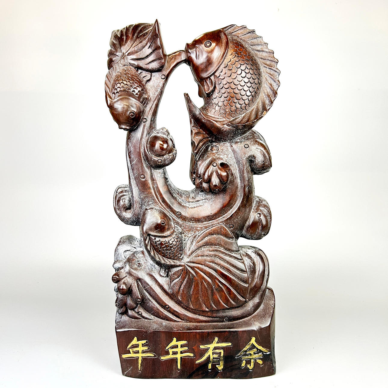 WOODEN FISH SCULPTURE.