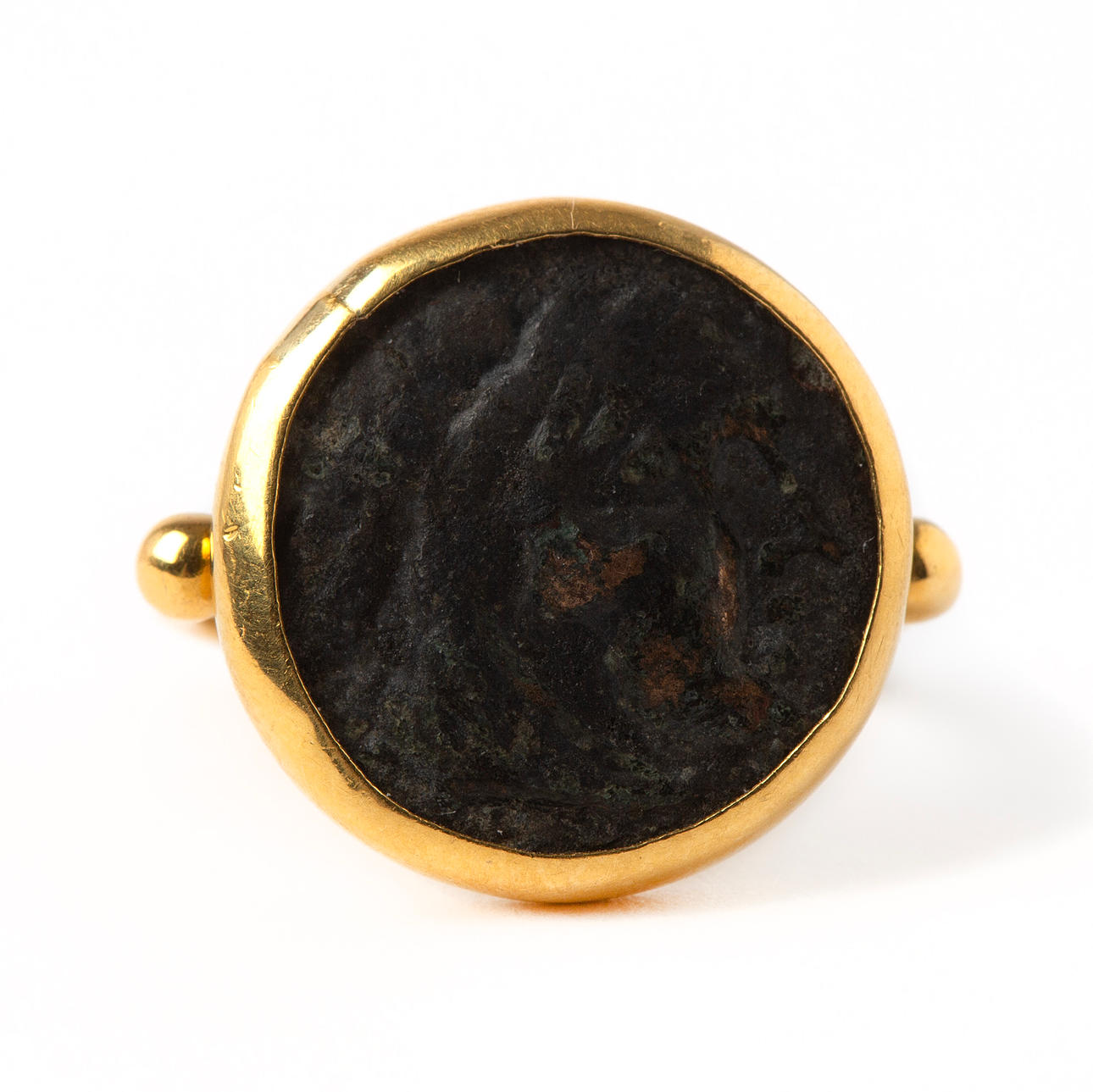 RING, 22K gold with copper coin.