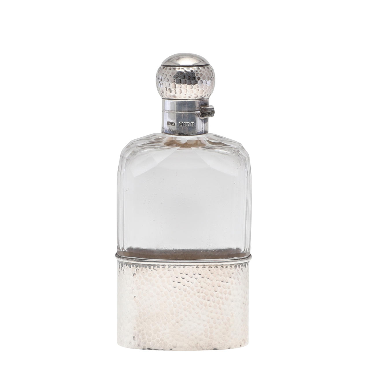 AN EDWARDIAN SILVER MOUNTED GLASS FLASK.